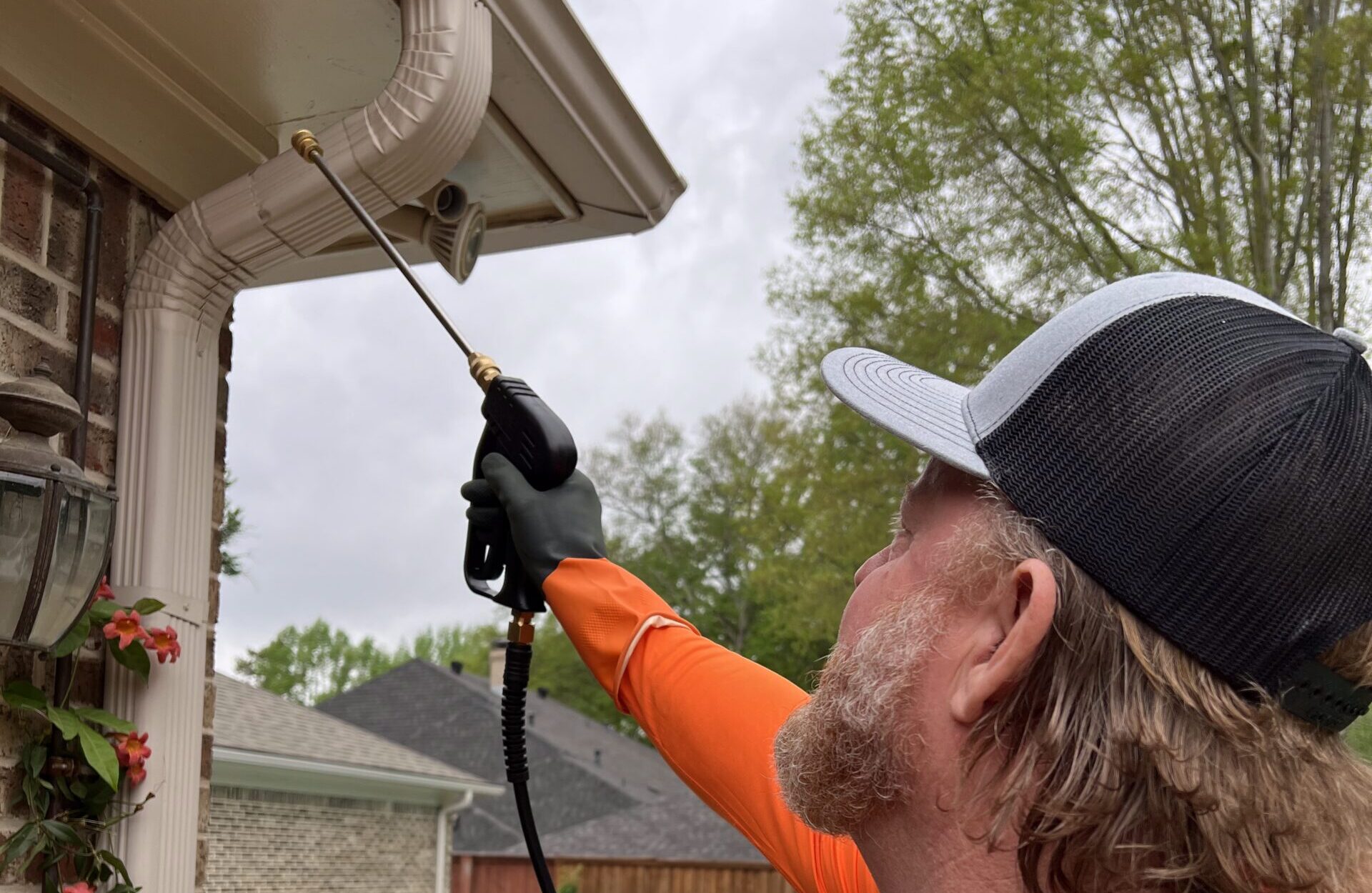 Local Pest Control Company Applying Exterior Treatment