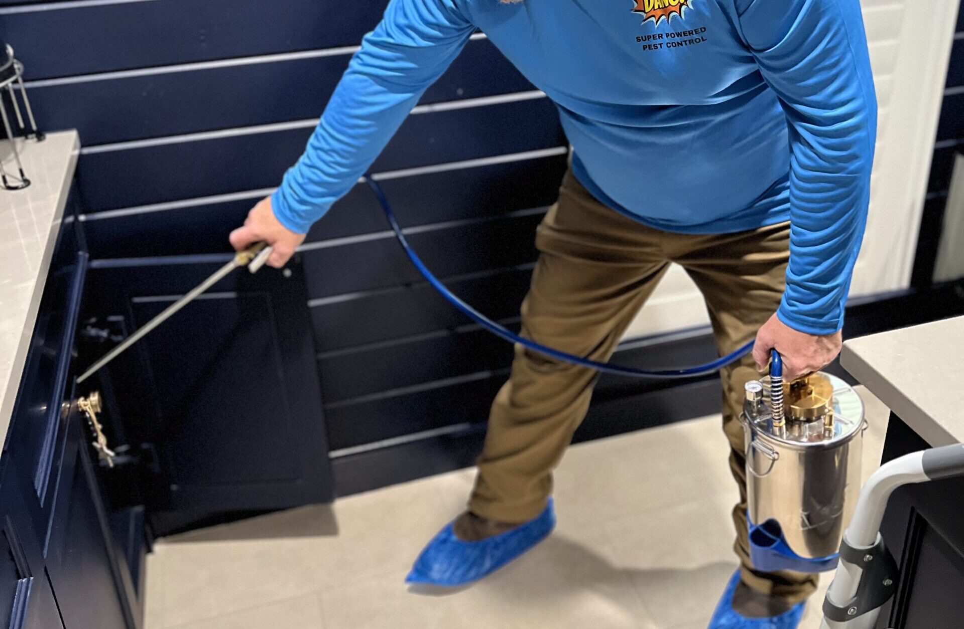Technician Providing Pest Control Services in Tyler TX